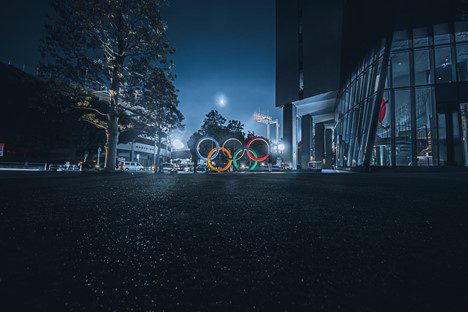 Olympic rings next to buildings