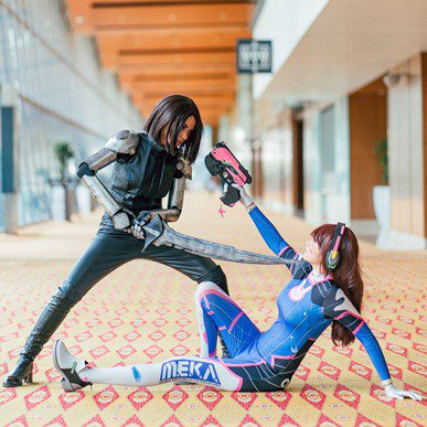 Two women fighting in a hallway